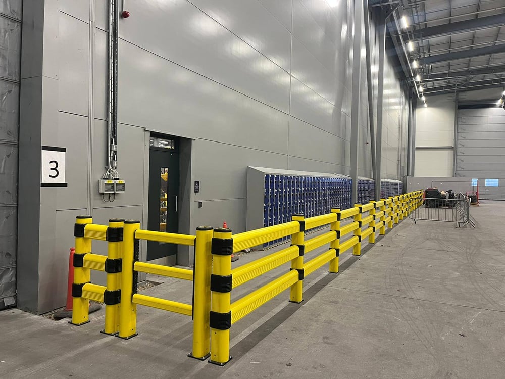 •	Polymer safety barriers in warehouse setting