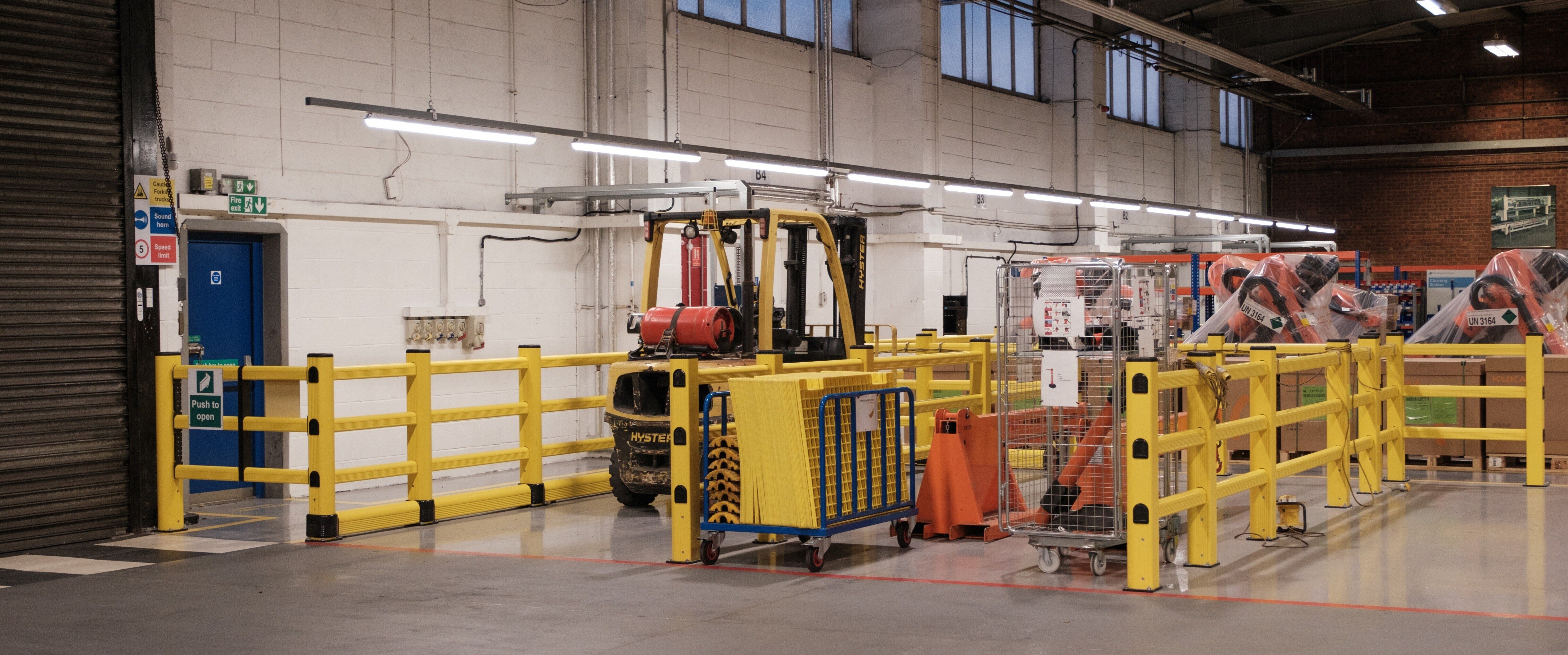 Comparison of steel vs polymer warehouse barriers after impact