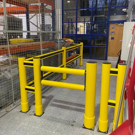 Polymer safety gate integrated into pedestrian segregation barrier system, UK warehouse