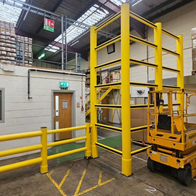 Bespoke topple barrier configured for high-level storage beside foot traffic
