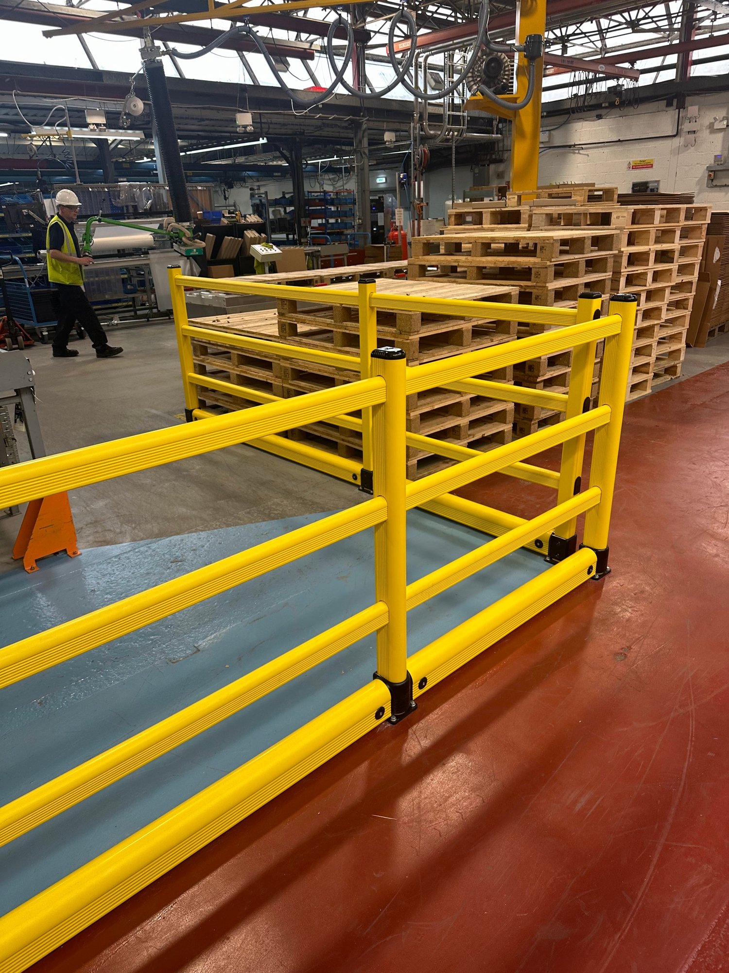 Polymer safety barriers protecting pedestrian and forklift routes