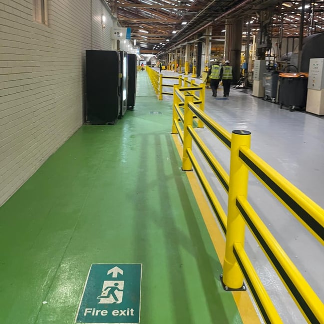 Indoor pedestrian segregation system installed in automotive manufacturing warehouse
