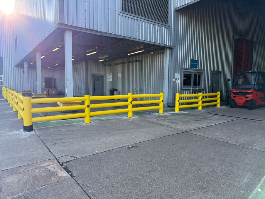 Segregated pedestrian route at warehouse entrance protecting staff from FLT movements
