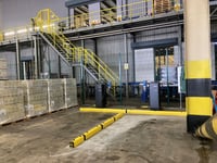 Forklift and pedestrian routes separated by compliant safety barriers