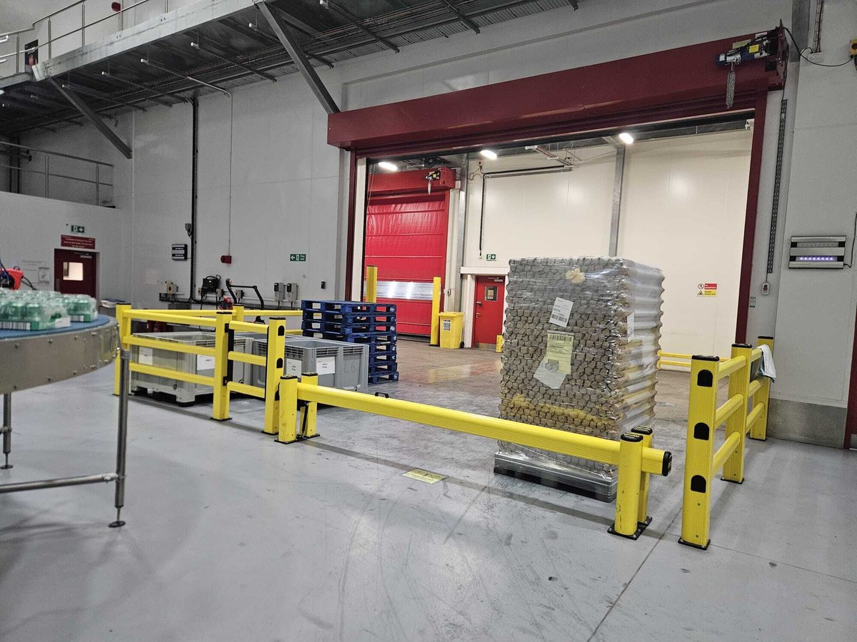 Modular polymer safety barriers installed in a UK warehouse by Clarity Safety