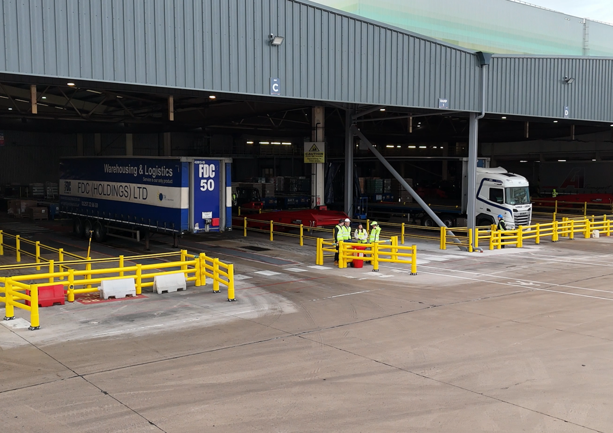 Warehouse safety site survey in progress identifying high-risk pedestrian crossing zones