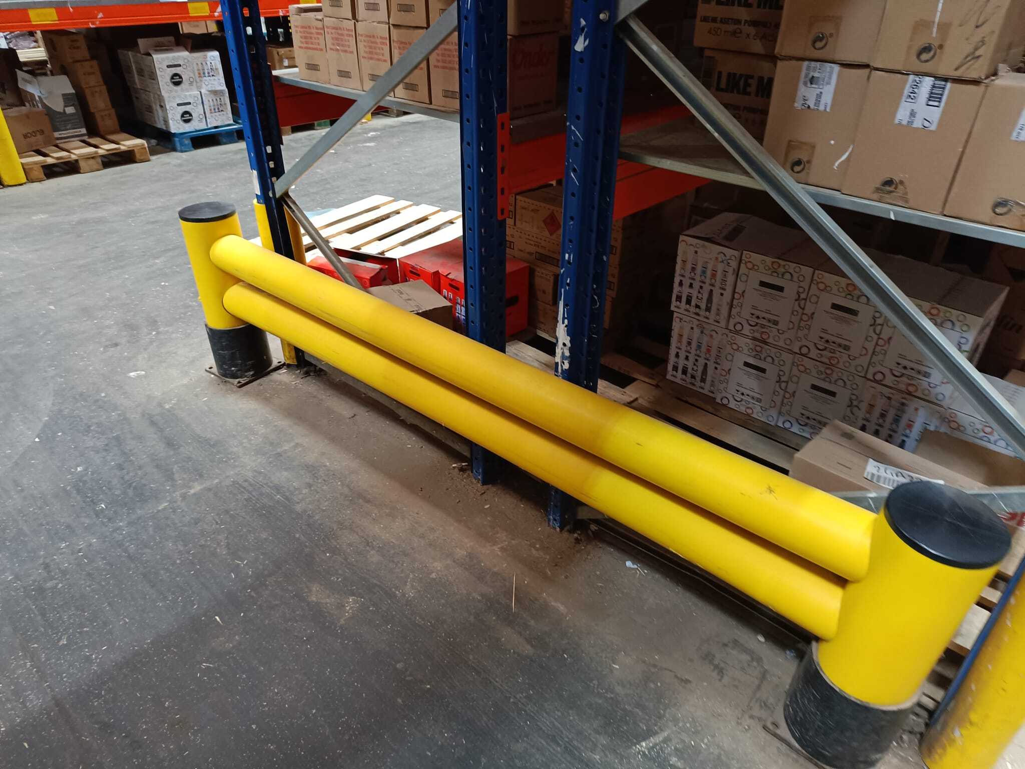 Four stakeholders reviewing polymer safety barriers on site during a walkthrough